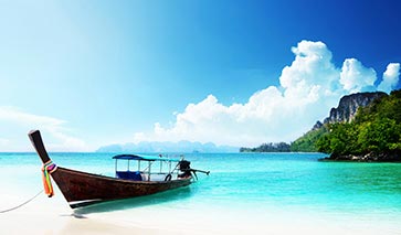 Thailand scene with boat moored in the foreground
