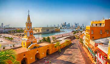 Coastal city in Colombia with orange buildings in the foreground