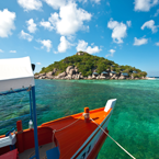 A boat sailing to a Thai island
