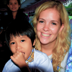 TEFL intern Lucy with a student at school in Cambodia