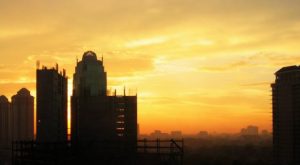 Indonesian city skyline at sunset