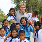 Thailand TEFL intern Harrison White with his students at school in Ayutthaya, Thailand