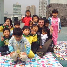 TEFL teacher with pupils in South Korea- outdoor classroom activity