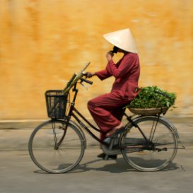 South East Asian Man Riding on Bicycle
