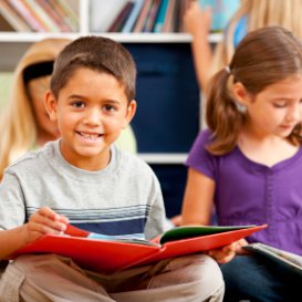 Child reading an English book