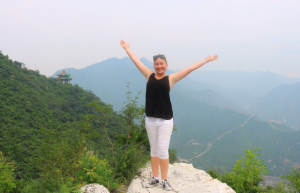 i-to-i intern Danni on top of a hill at the Great Wall of China