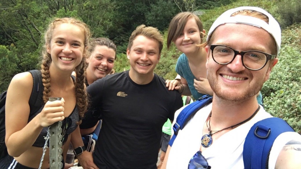 Group of South Africa TEFL interns hiking up Table Mountain