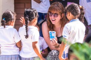 TEFL teacher playing a classroom game with students