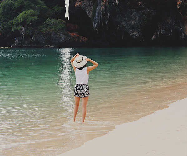 Girl in the sea on a beach in Thailand