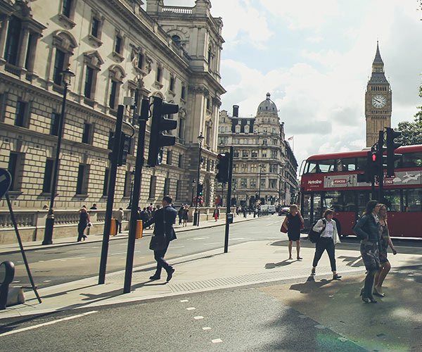 Man walking infront of Big Ben in London