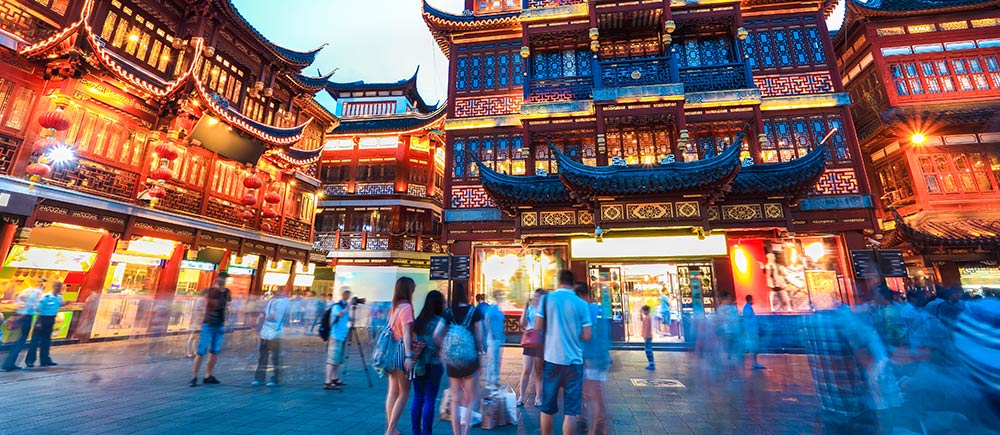 Buildings lit up at night in China