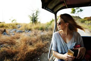 girl in car travelling