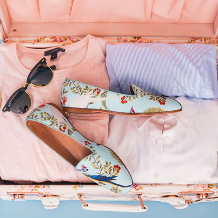 Suitcase full of clothes
