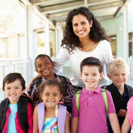 TEACHER WITH STUDENTS