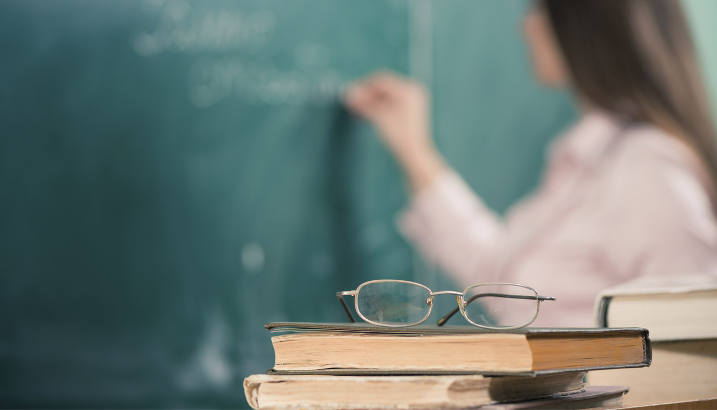 Classroom with books and chalkboard