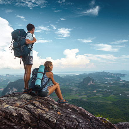 2 hikers at top of mountain