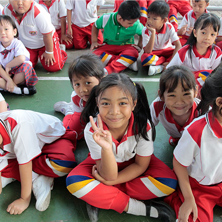 Children smiling in classroom