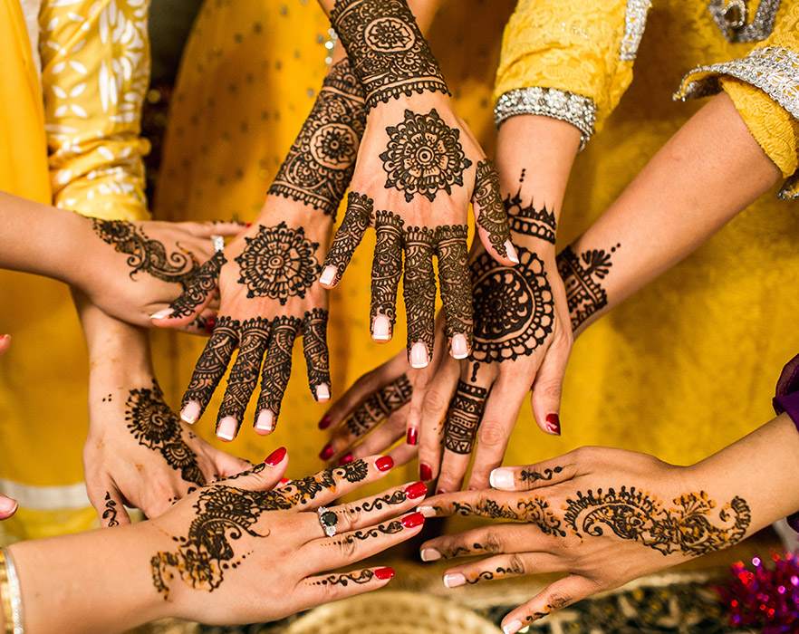 Henna tattoo'd hands