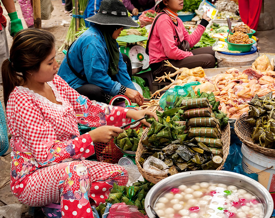 Khmer woman selling street food - Cambodia