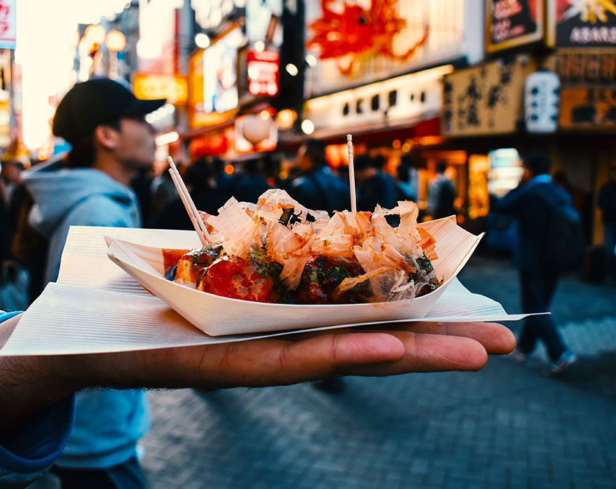 Man holding Japanese food