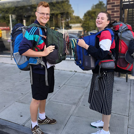 Mitch and girlfriend with backpacks