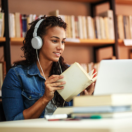 Woman studying on laptop