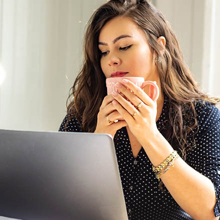 Woman on her laptop job hunting