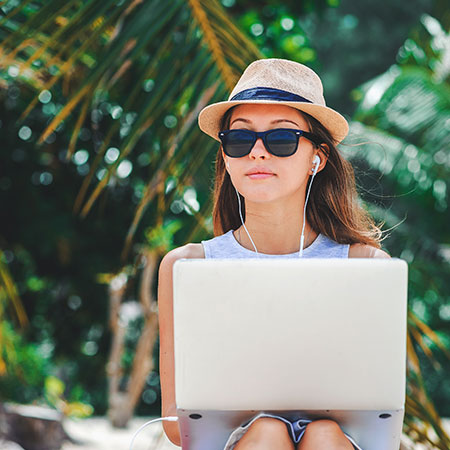 girl teaching english online on her computer