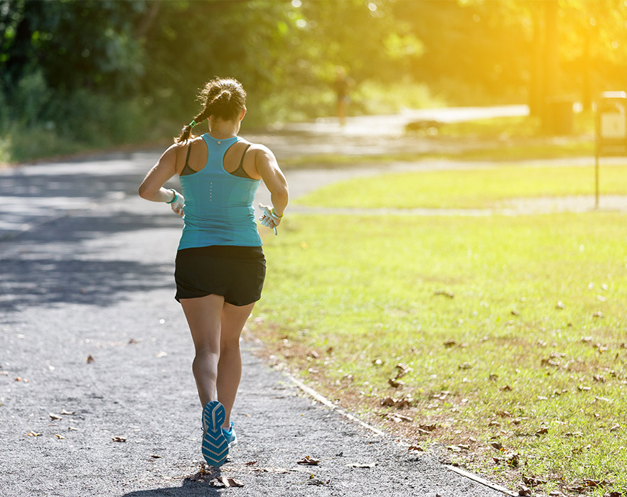 Woman running in park