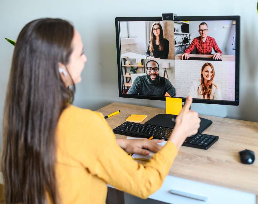 woman conducting group lesson online