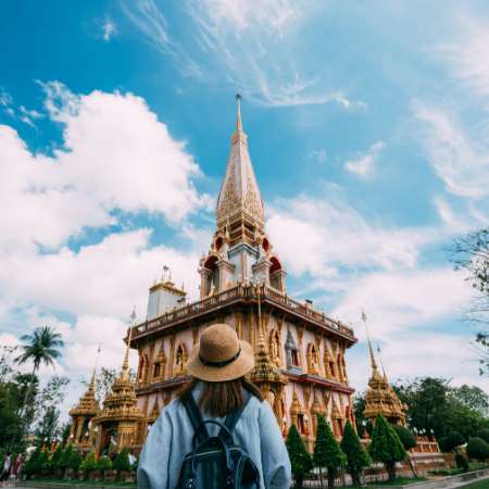 Temple in Asia. Woman exploring whilst TEFL