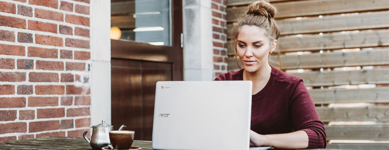 woman typing on a laptop computer