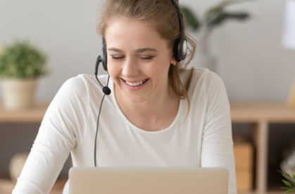 girl with headset having an online lesson