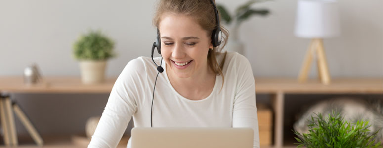 happy girl with a headset viewing an introductory video