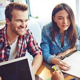 two students improving their English language skills