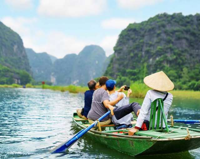 people on boat in vietnam