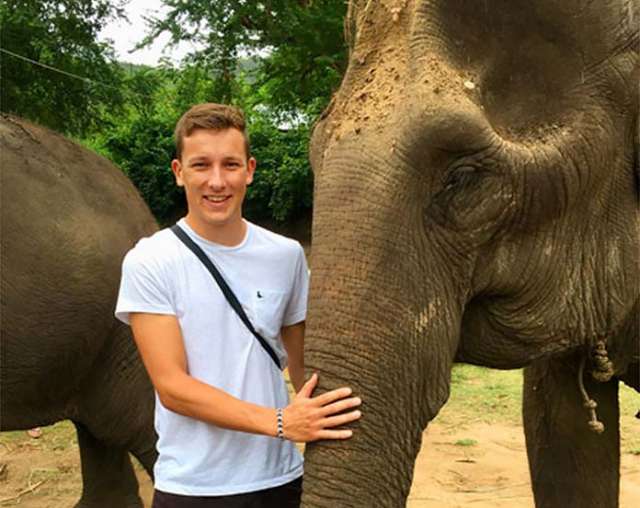 TEFL student with elephant