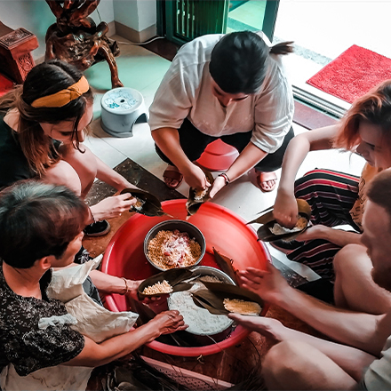 Aileen and friends eating Chinese meal