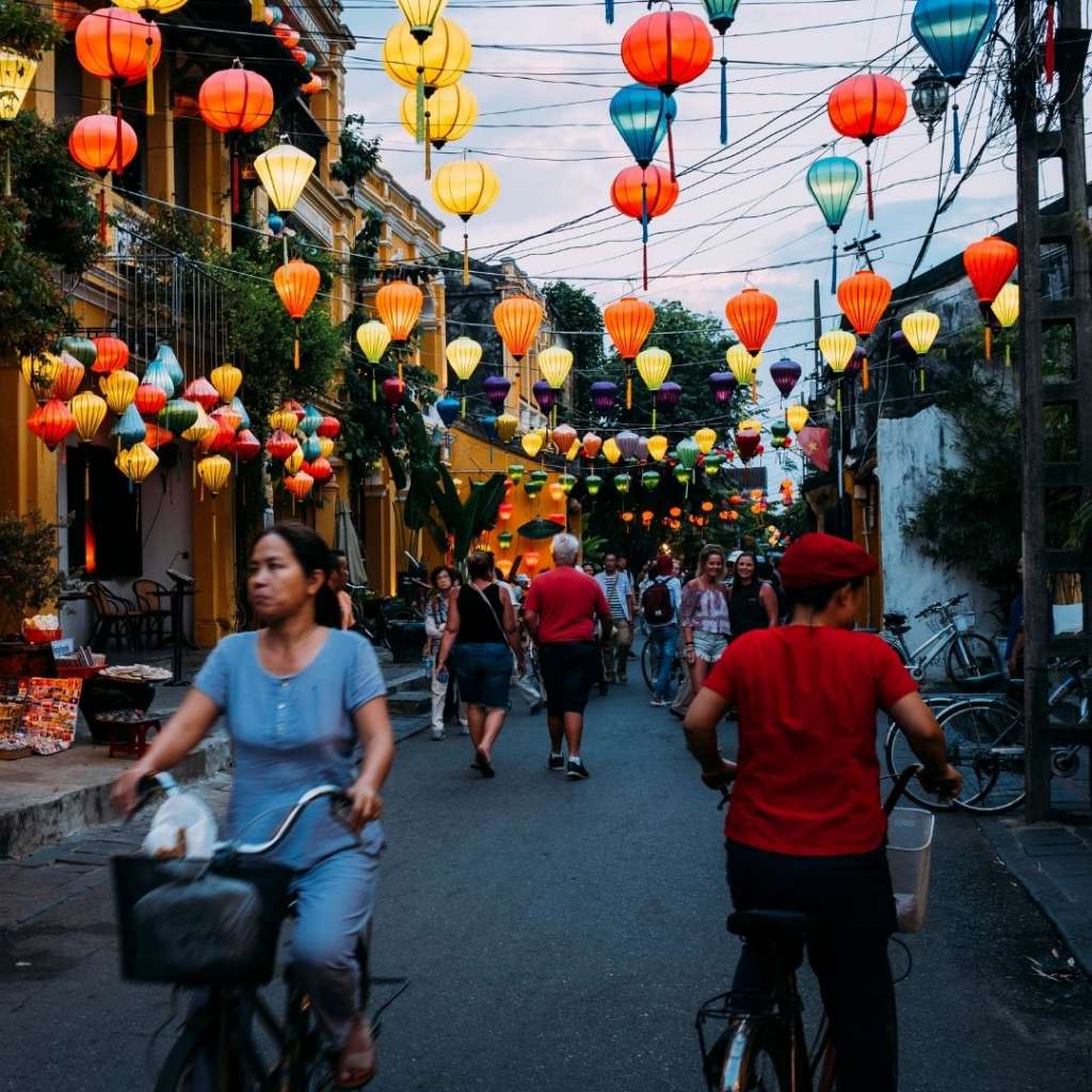 people walking through the streets in Vietnam