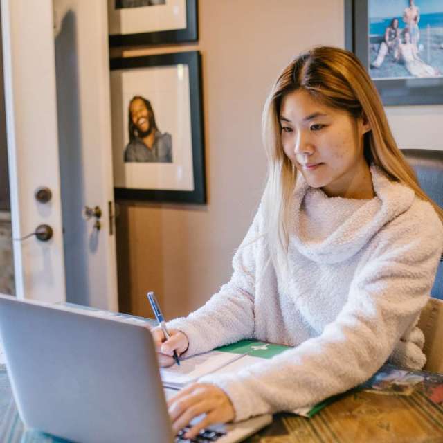 girl studying on laptop
