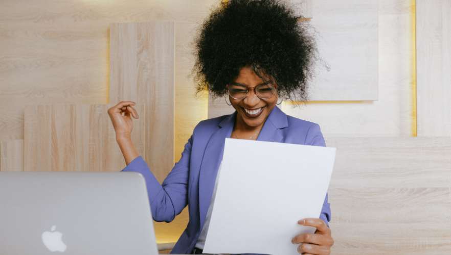 happy woman with esl certificate