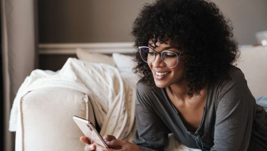 woman looking at her phone