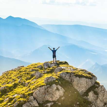 teacher on top of a mountain